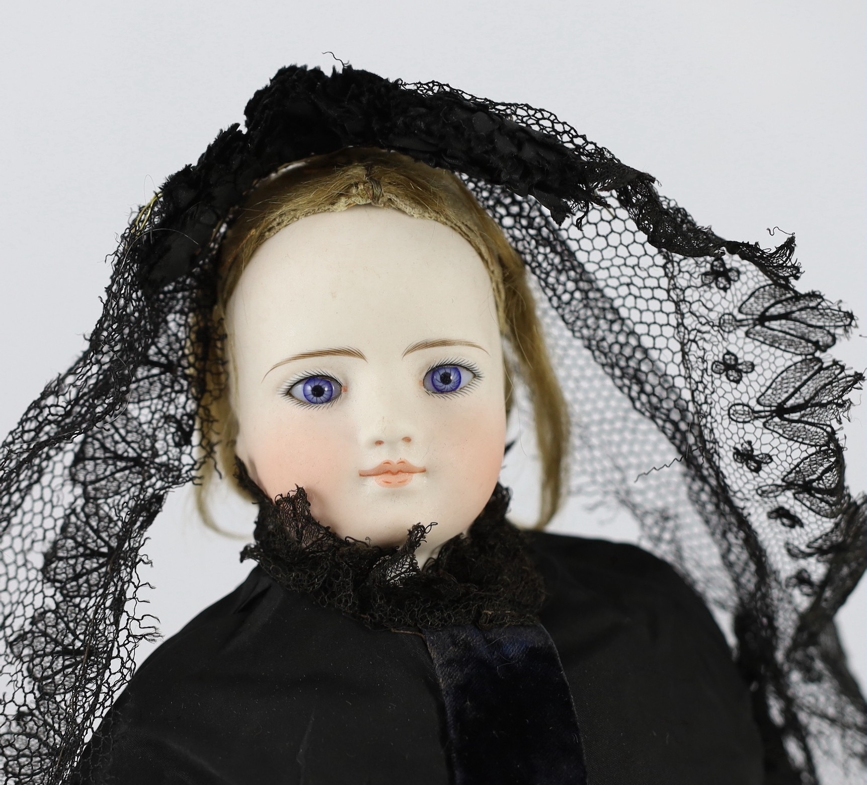 A Simon & Halbig swivel head bisque fashion doll, German head on French body, circa 1875